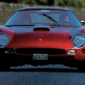 Touring through France in a hot, cramped car built for racing did not bring smiles to everyone's faces. Touring through France in a hot, cramped car built for racing did not bring smiles to everyone's faces.